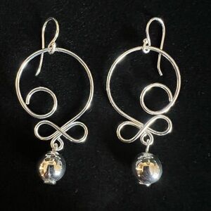 Flirty, Fun Silver Swirl Earrings